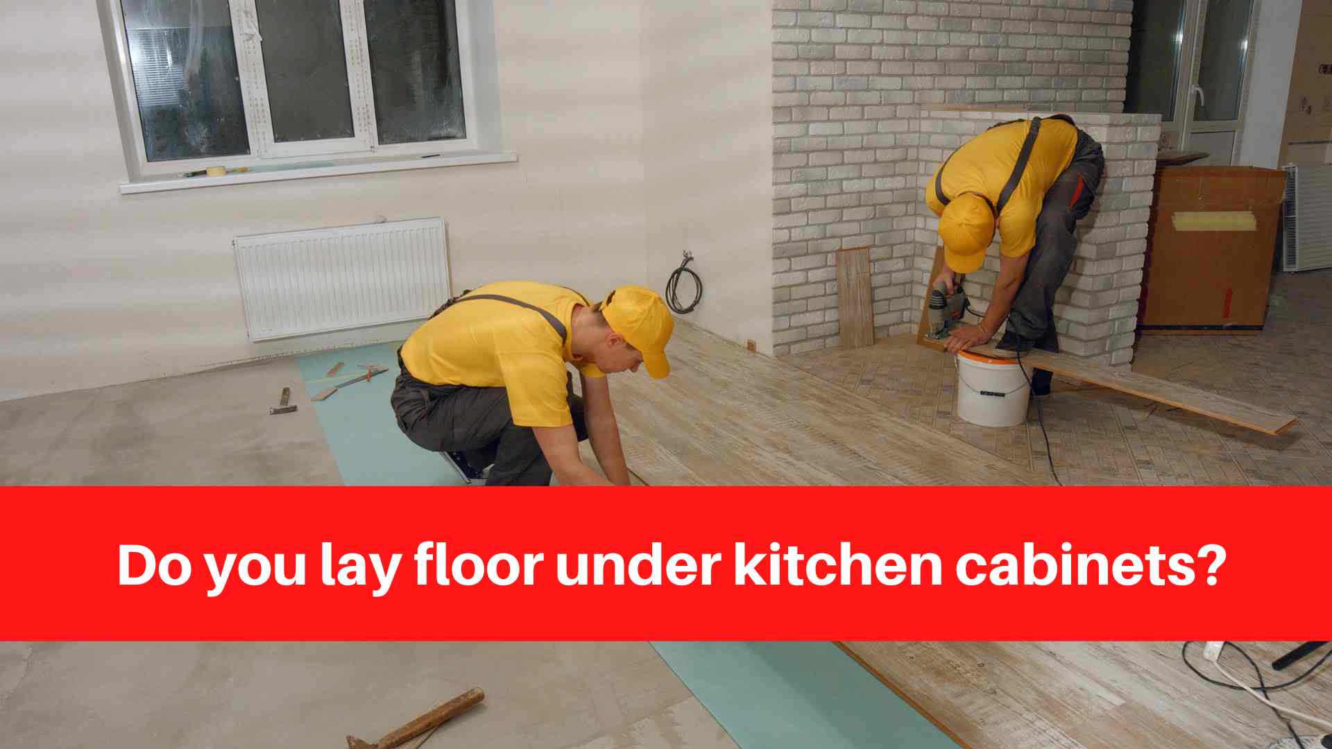 Do you lay floor under kitchen cabinets